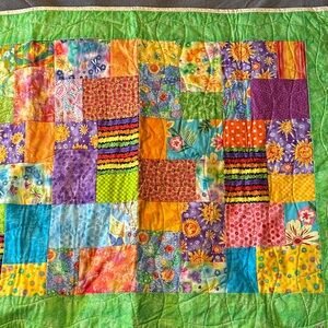 Small Vibrant Patchwork Quilt with Green Border